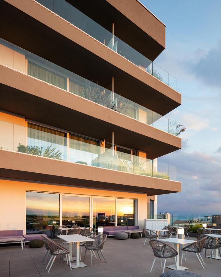 J44 Lifestyle Hotel Lido di Jesolo Exteriör bild The 3D rendering of the building
